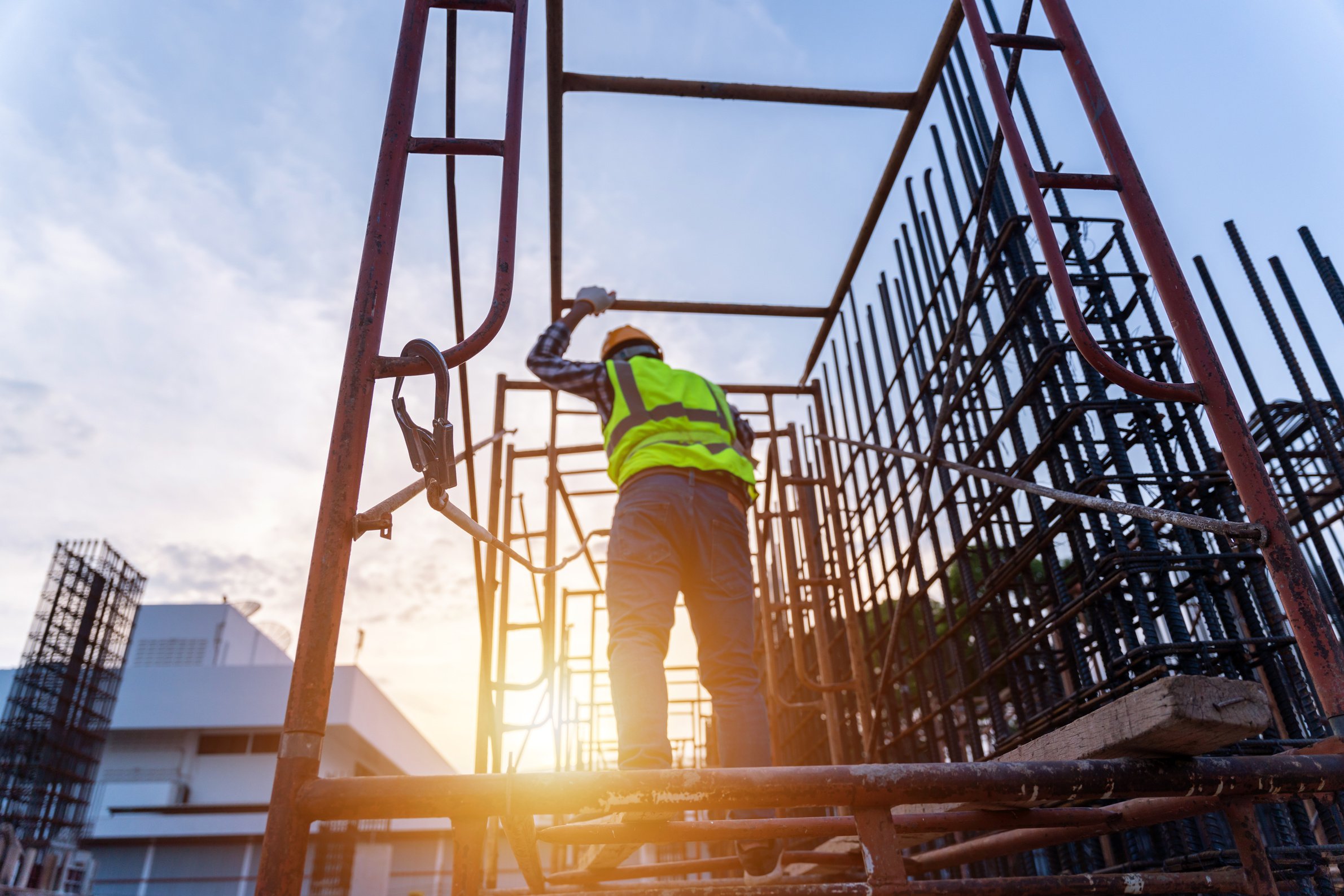 Worker working at height equipment constructive at construct